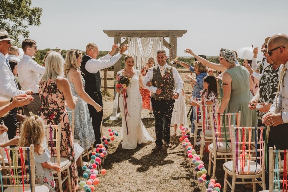 Festival themed wedding ceremony outdoors