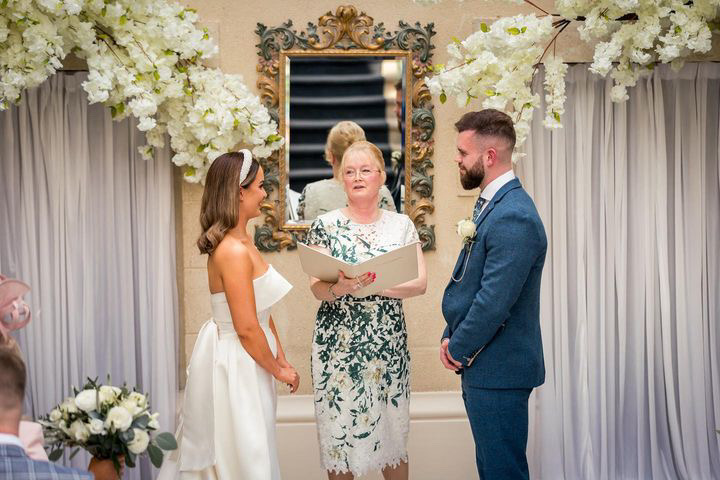 Lauren Duncan Celebrant conducting a wedding ceremony in The Orangery at Nailcote Hall